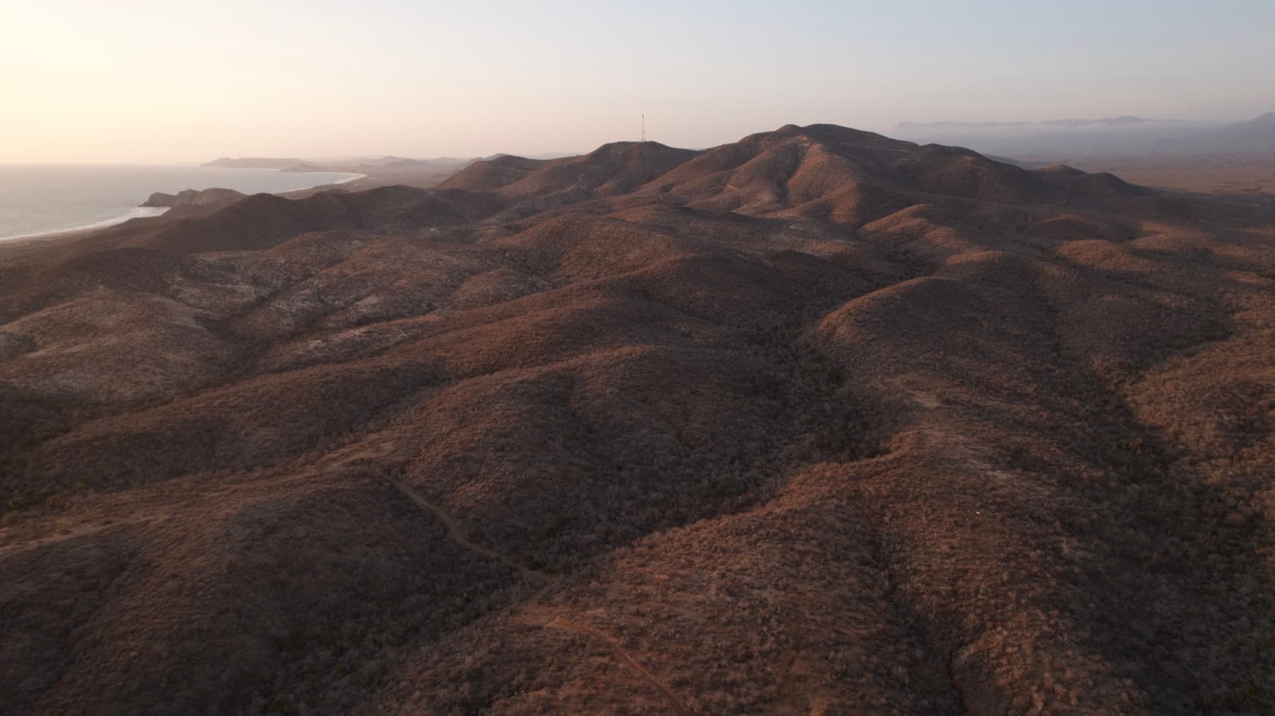 The hills falling away toward the bay